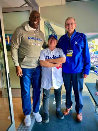With Dodger Owners....
MAGIC JOHNSON and Little League teammate BOB PLUMMER